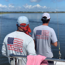 Load image into Gallery viewer, Reel Rebel Silver Long Sleeve 50+ UPF Performance Shirt with American Flag
